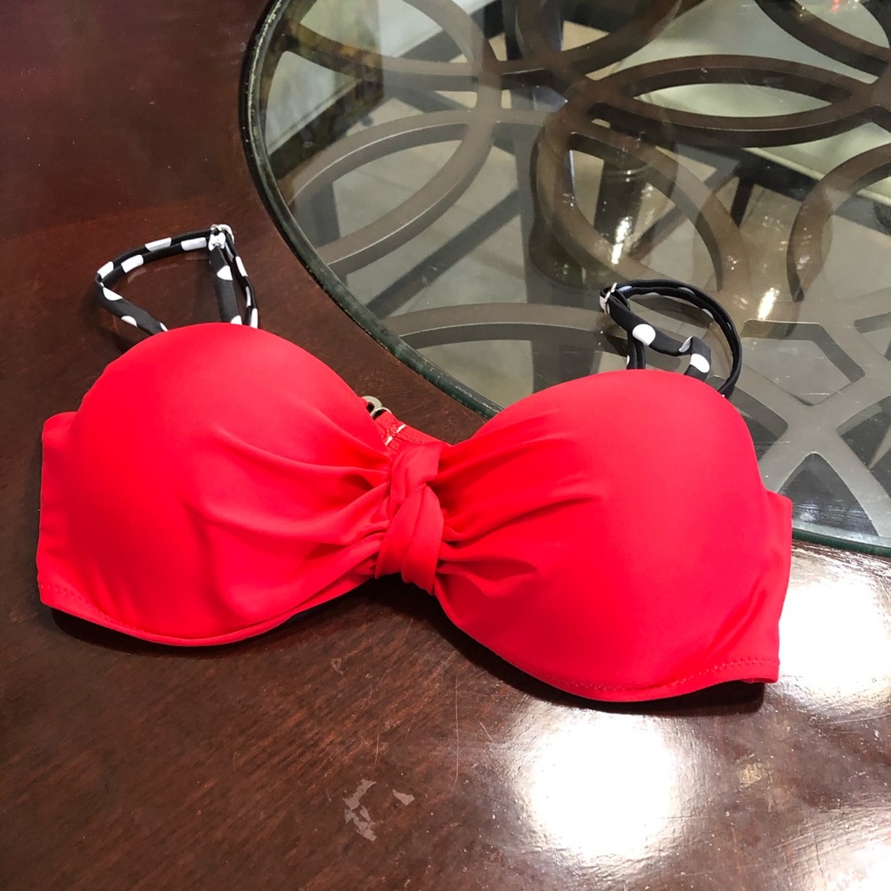 Red bikini top with polka dots pattern straps